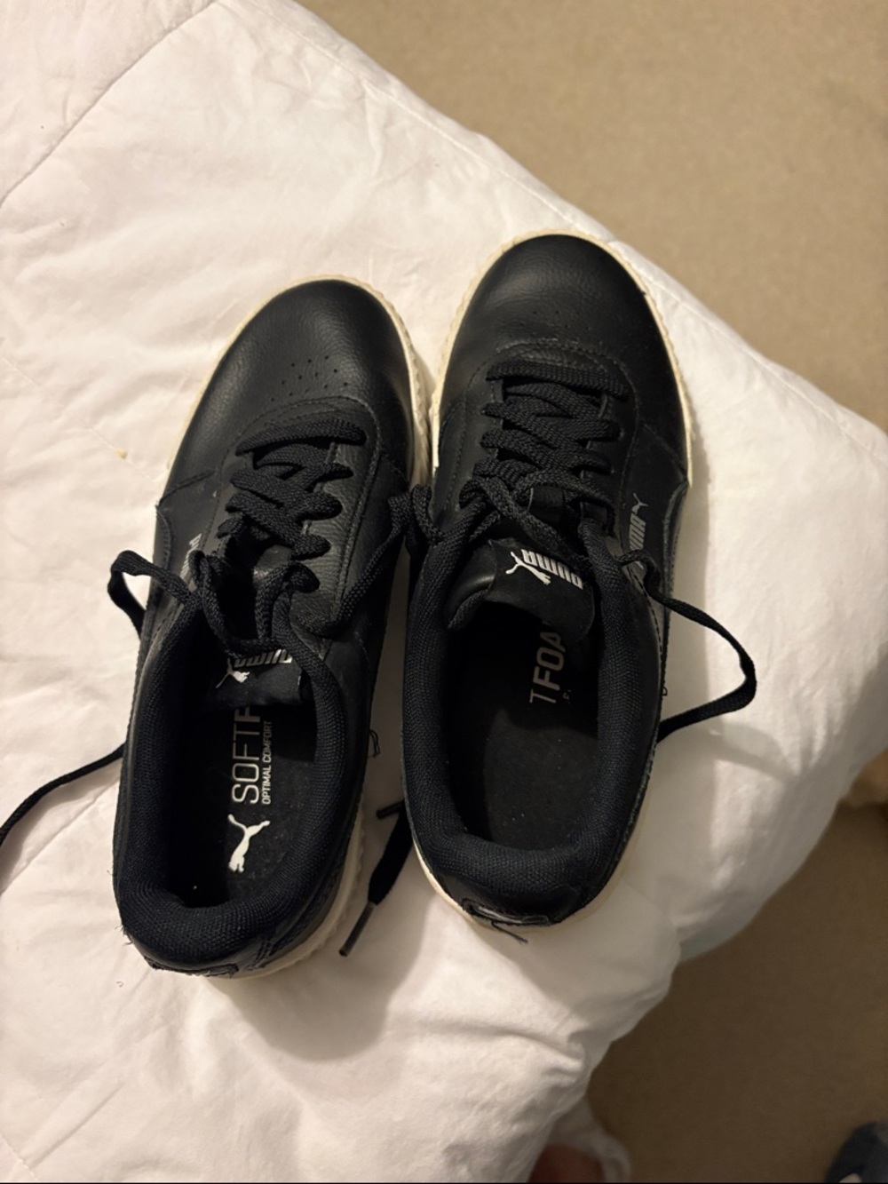 Puma women’s black sneakers